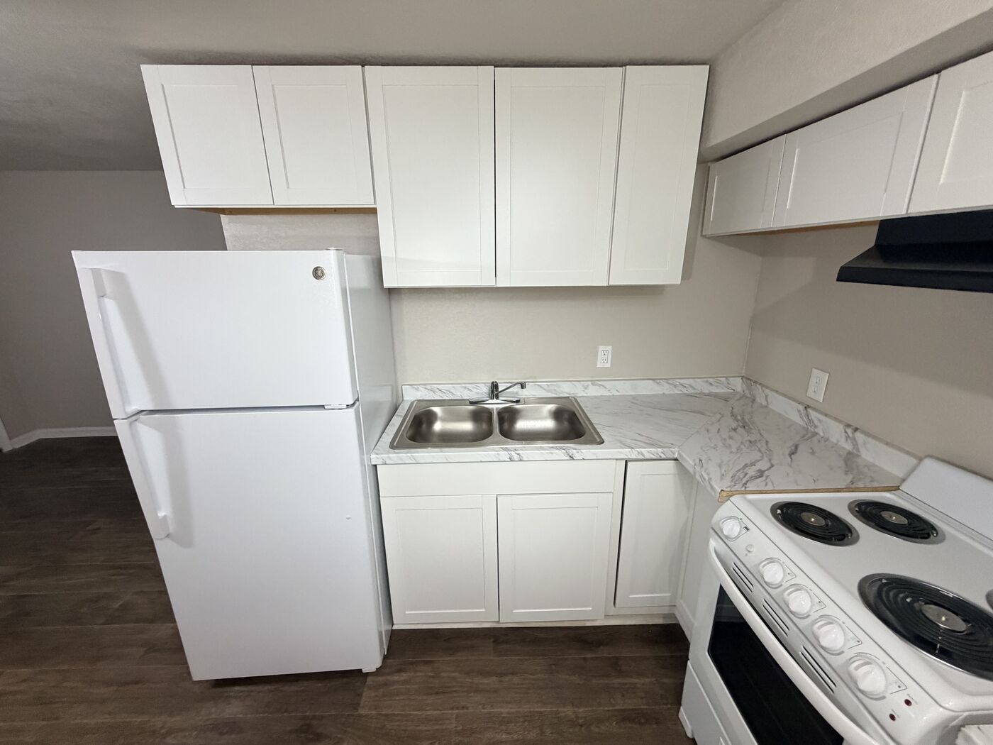 1-bedroom apartment kitchen with range and refrigerator